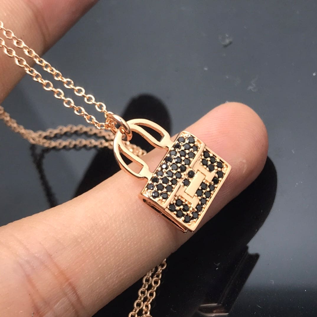 Hermes Amulettes Kelly Black Diamonds 18K Gold Necklace