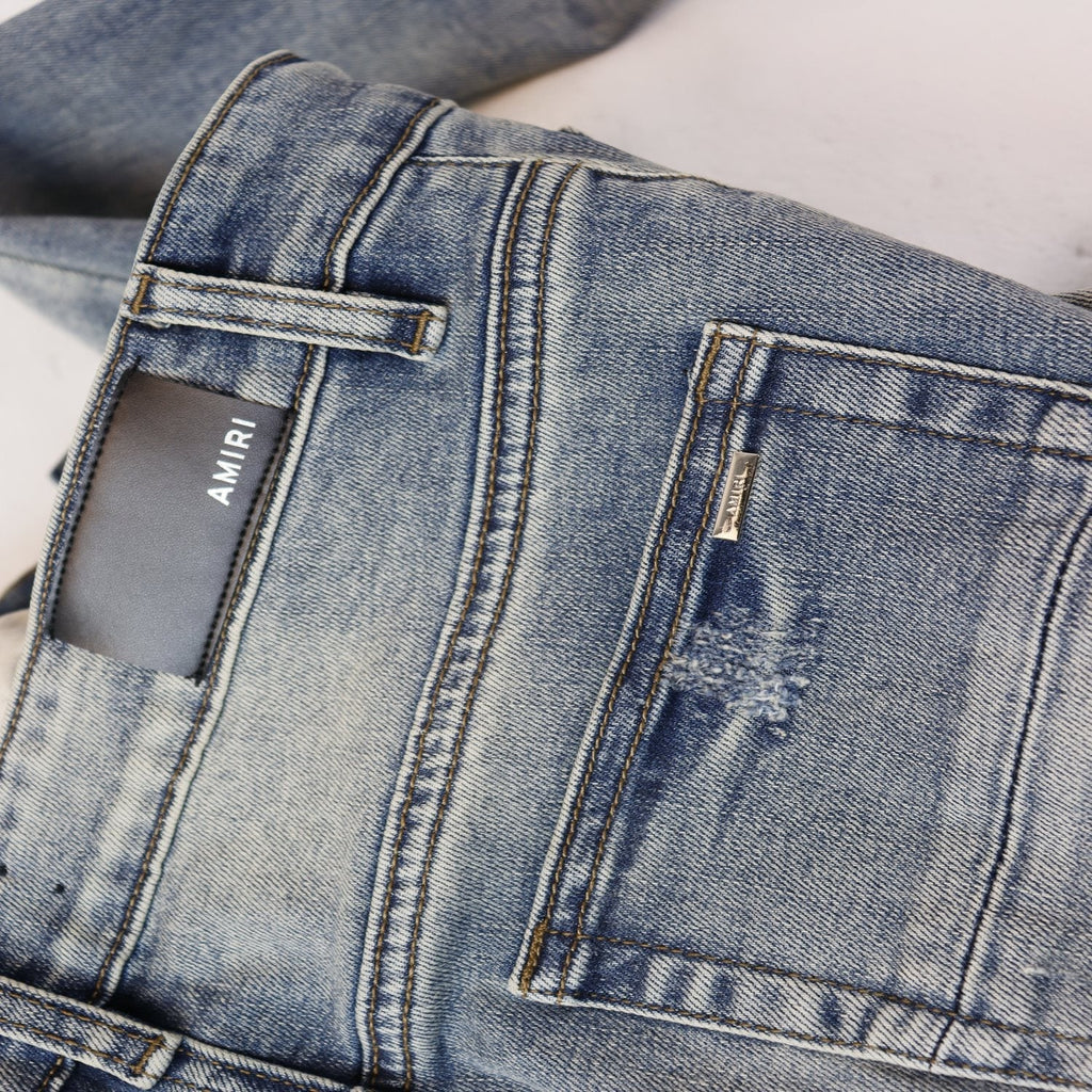 AMIRI Sinners Distressed Skinny Jeans — detail
