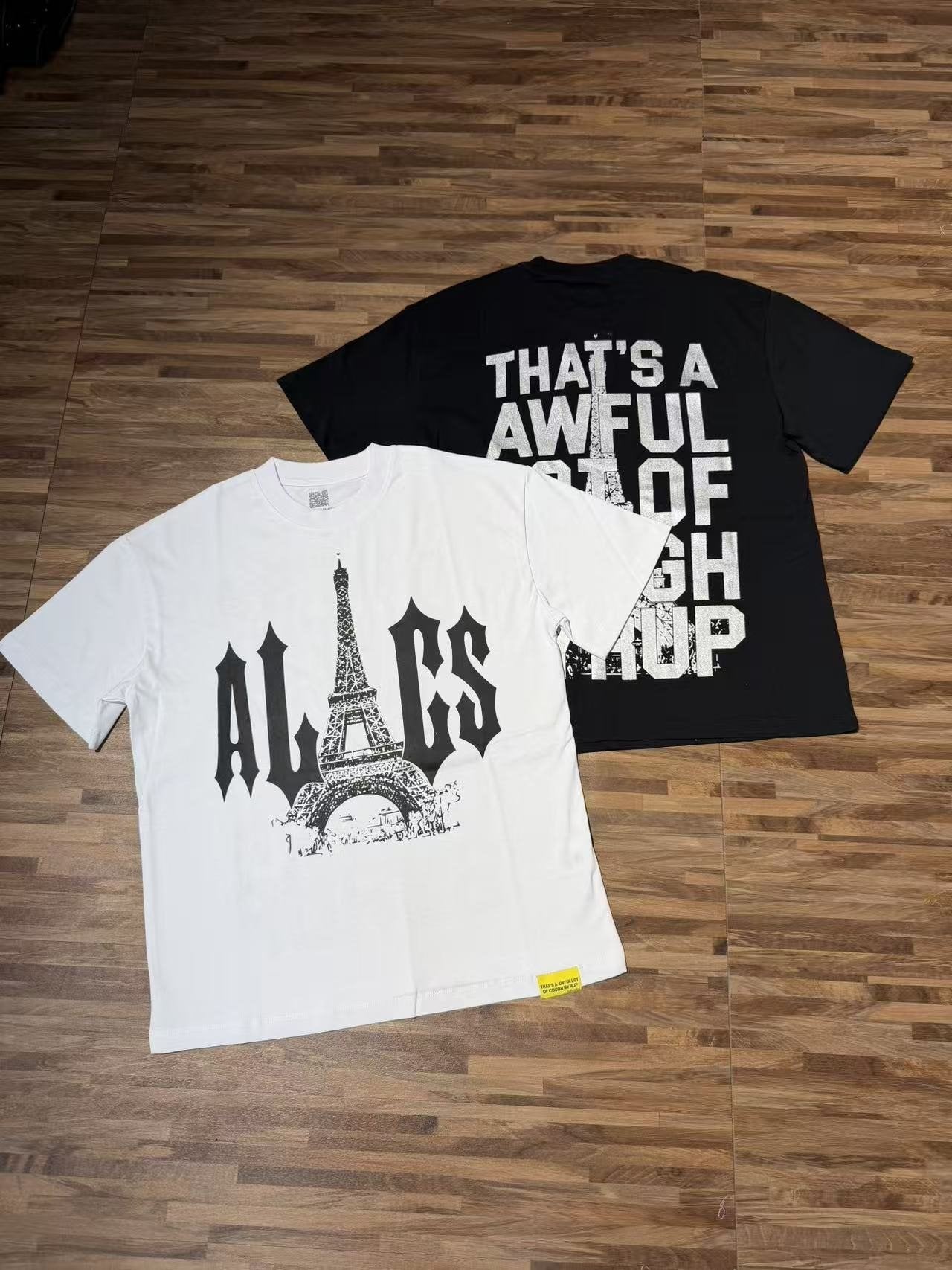 THAT'S A AWFUL LOT OF COUGH SYRUP Eiffel Tower Graphic T-Shirt — context