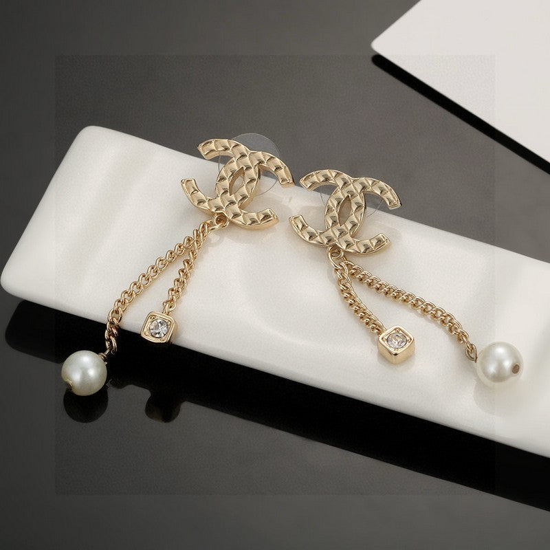 Chanel Long Pearl Pendant 18K Gold Earrings